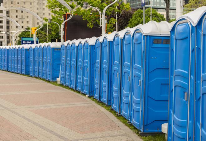 a row of portable restrooms at a fairground, offering visitors a clean and hassle-free experience in summit
